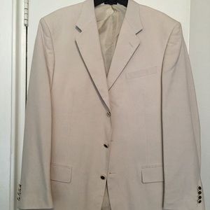 Cream blazer with black buttons